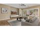 Staged living room with modern furniture and ample natural light at 1561 Campfire Ln, Mesquite, NV 89034