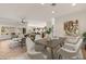 Spacious, open-concept living room with modern furnishings and lots of natural light at 1561 Campfire Ln, Mesquite, NV 89034