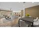 Open living space featuring large windows, a dining area and view to kitchen at 1561 Campfire Ln, Mesquite, NV 89034