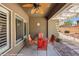 Covered patio with desert landscaping and outdoor seating at 1561 Campfire Ln, Mesquite, NV 89034