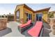 Open-air balcony lounge featuring stunning desert views, perfect for relaxing and enjoying the outdoors at 16 Cerchio Basso, Henderson, NV 89011