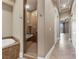 Elegant bathroom featuring a tiled shower and a soaking tub, providing a relaxing retreat at 16 Cerchio Basso, Henderson, NV 89011