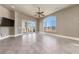 Bright bedroom featuring a large window with scenic views and a ceiling fan at 16 Cerchio Basso, Henderson, NV 89011