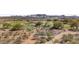 Picturesque golf course view with players enjoying a sunny day surrounded by desert landscape at 16 Cerchio Basso, Henderson, NV 89011