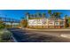 Entrance sign for Lake Las Vegas with bridge, palm trees, and clear blue sky at 16 Cerchio Basso, Henderson, NV 89011