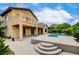 Stunning backyard with a covered patio, balcony, and a refreshing pool, perfect for outdoor enjoyment at 17 Stonemark Dr, Henderson, NV 89052