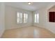 Bedroom with tile flooring, plantation shutters and white walls creating a bright space at 17 Stonemark Dr, Henderson, NV 89052