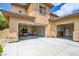 Spacious three-car garage showcasing ample parking space, durable flooring, and overhead lighting at 17 Stonemark Dr, Henderson, NV 89052