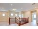 Second story hallway featuring a staircase and hardwood floors at 17 Stonemark Dr, Henderson, NV 89052