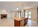Spacious kitchen island with stainless steel appliances and granite countertops, perfect for entertaining guests at 17 Stonemark Dr, Henderson, NV 89052