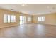 Living room featuring light wood floors, white walls, plantation shutters and recessed lighting throughout at 17 Stonemark Dr, Henderson, NV 89052