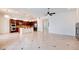 Open-concept living area boasts tile floors, recessed lighting, and a clear view of the gourmet kitchen at 17 Stonemark Dr, Henderson, NV 89052