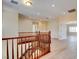 Wooden staircase featuring wood floors, white walls, and recessed lighting illuminating the way at 17 Stonemark Dr, Henderson, NV 89052