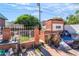 Large backyard includes block wall, wrought iron fencing, and a brick BBQ at 1708 Weeping Willow Ln, Las Vegas, NV 89104