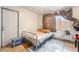View of a bedroom with a door, and a small window at 1708 Weeping Willow Ln, Las Vegas, NV 89104