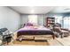 Bedroom featuring natural light, cozy furniture, and comfortable living space at 1708 Weeping Willow Ln, Las Vegas, NV 89104