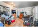 Cozy room features a bed, TV, dresser, and closet with clothing and personal belongings at 1708 Weeping Willow Ln, Las Vegas, NV 89104