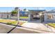 Charming home featuring an enclosed front yard with a large driveway at 1708 Weeping Willow Ln, Las Vegas, NV 89104