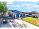 View of the property, highlighting the lawn, patio, and carport at 1708 Weeping Willow Ln, Las Vegas, NV 89104