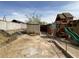 Backyard with a play structure and storage shed at 204 Bradshaw Way, Las Vegas, NV 89145