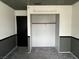 Bedroom with painted base and closet with quote at 204 Bradshaw Way, Las Vegas, NV 89145