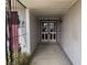 Covered entryway showcasing a secure wrought iron gate and double entry doors at 204 Bradshaw Way, Las Vegas, NV 89145
