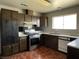 Kitchen featuring wood cabinets and white countertops; a functional space at 204 Bradshaw Way, Las Vegas, NV 89145