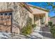Close up of the front of the home, with desert landscaping, and a two car garage at 2152 Mountain City St, Henderson, NV 89052