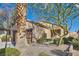 Charming single-story home with desert landscaping and a two-car garage under a clear sky at 2152 Mountain City St, Henderson, NV 89052