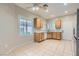 Clean kitchen featuring tile flooring, white countertops, and bright, natural light at 2152 Mountain City St, Henderson, NV 89052