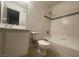 Neat bathroom featuring a bathtub and sink with vanity at 220 Mission Newport Ln # 201, Las Vegas, NV 89107