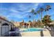 Inviting community pool with lounge chairs, spa and landscaped surroundings at 220 Mission Newport Ln # 201, Las Vegas, NV 89107