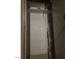 A utility closet featuring built-in shelving and housing a water heater at 220 Mission Newport Ln # 201, Las Vegas, NV 89107