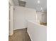 Upstairs hallway with wood floors and curved wall at 227 Palmarosa St, Henderson, NV 89015