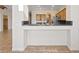 A kitchen featuring a pass-through bar to the dining area at 227 Palmarosa St, Henderson, NV 89015