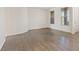 Bright living room features hardwood floors, natural light, and neutral paint at 227 Palmarosa St, Henderson, NV 89015
