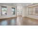 Spacious living room featuring hardwood floors, recessed lighting, and ample windows at 227 Palmarosa St, Henderson, NV 89015