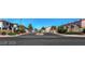 Gated community entrance with lush landscaping and secure access at 2524 Charleville Ave # 102, Las Vegas, NV 89106