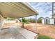 Backyard featuring a covered patio, small palm tree and additional storage at 2825 Berg St, North Las Vegas, NV 89030