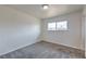 Bedroom showcasing a window, neutral carpet, and white walls providing a blank canvas at 2825 Berg St, North Las Vegas, NV 89030