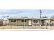Charming single-story home with a fenced yard and an inviting front entrance at 2825 Berg St, North Las Vegas, NV 89030