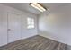 Versatile room featuring durable vinyl flooring and fresh white walls at 2825 Berg St, North Las Vegas, NV 89030