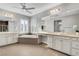Large bathroom with double sinks, a garden tub, and a separate vanity area at 305 Rezzo St, Las Vegas, NV 89138