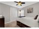 Comfortable bedroom with closet, plantation shutters, and soft carpeting at 305 Rezzo St, Las Vegas, NV 89138