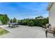 Well-maintained backyard with a ping pong table, mature foliage, and outdoor seating for relaxation at 3175 S Torrey Pines Dr, Las Vegas, NV 89146