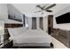 Comfortable bedroom featuring a stylish bed, modern dresser, and ample closet space at 3175 S Torrey Pines Dr, Las Vegas, NV 89146