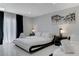 Modern bedroom with two beds, black accents, and marble-style wall art at 3175 S Torrey Pines Dr, Las Vegas, NV 89146