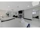 Spacious bedroom featuring two beds, a fireplace and sleek tile flooring at 3175 S Torrey Pines Dr, Las Vegas, NV 89146