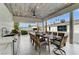Charming outdoor dining area with a built-in grill and ample seating, perfect for entertaining guests at 3175 S Torrey Pines Dr, Las Vegas, NV 89146