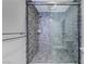 Contemporary shower with tiled walls, multiple shower heads, and stylish fixtures at 3175 S Torrey Pines Dr, Las Vegas, NV 89146